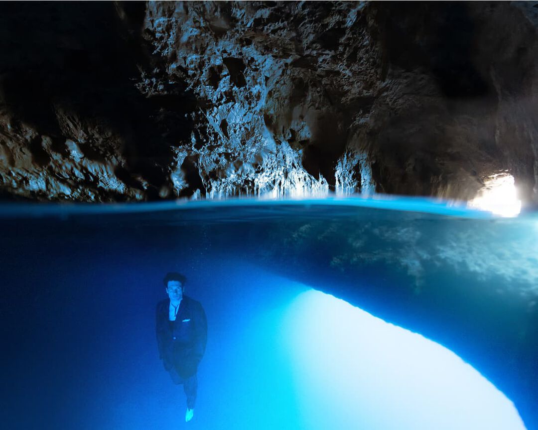 A sea underwater shot of a Stefano Ricci suit